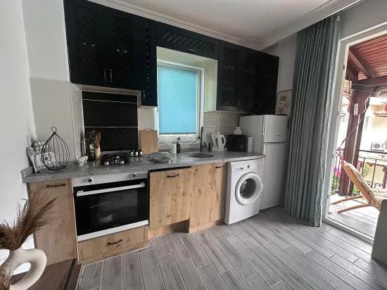 Dalyanda 1. kat apart ve geniş güzel bahçe
